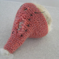 Wool yarn, baseball, dog fur, waxed twine, 4:H x 4"W x 6.75"D, 2003