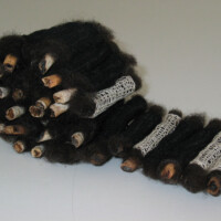 Cigarette butts, sheep's wool, cotton crochet thread, 3"H x 12" x 4.5"D, 2002